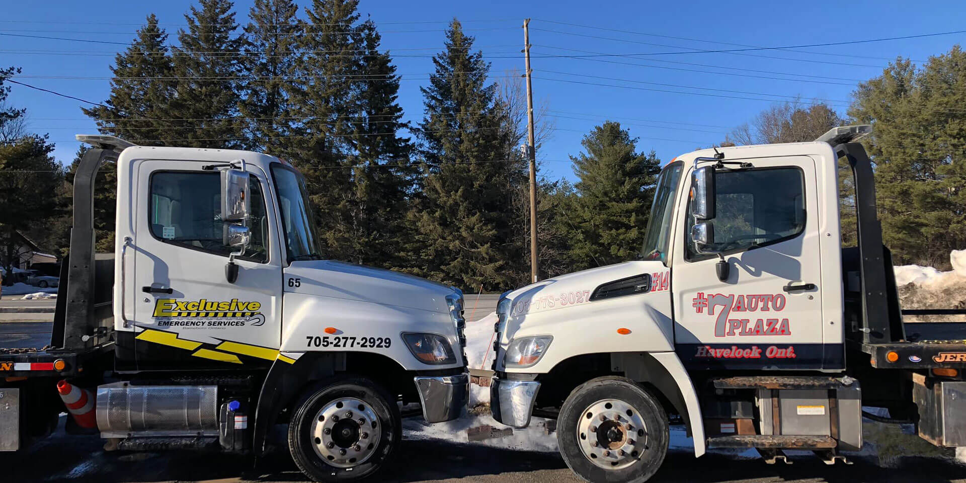 number 7 auto plaza towing trucks